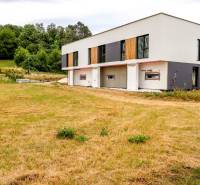 A family house in Piešťany, located near a forest on a large green area.