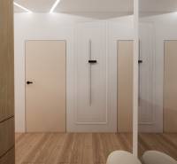 Interior with white walls, wooden doors, and a wooden decor floor by Výstavba bytov.