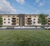 Construction of apartments in Kriváň with cars and pedestrians, surrounded by greenery.