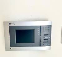 Interior control panel in a 2-room apartment with a touch screen and control buttons.