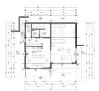 Floor plan of a villa with a kitchen, dining room, bathroom, and living room.