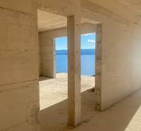Unfinished spaces of a villa in Duće with a view of the sea and mountains.