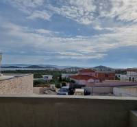 The view from the villa in Vodice of the sea and the surrounding landscape under the clouds.