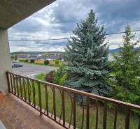 The view from the balcony of a family house in Nové Mesto nad Váhom overlooking the surroundings and greenery.