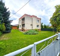 A family house in Nové Mesto nad Váhom, surrounded by a garden and greenery.