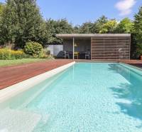 A family house with a swimming pool, garden, and terrace near Longobardská Street in Bratislava - Rusovce.