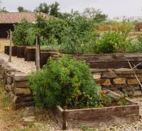 Raised garden beds in the backyard of a family house on Kopanice Street in Krupina.