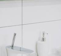 Bathroom faucet and soap dispenser in a family house.