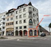Building on Petőfi Street in Komárno with commercial premises and marked space number 1.