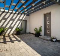 Entrance part of a family house with a terrace and pergola in Galanta on Richtarske pole.