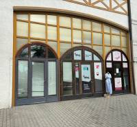 Commercial premises on Petöfiho Street in Komárno with large windows and a mannequin.