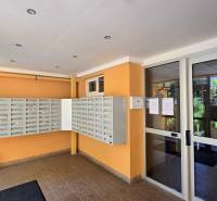 The entrance hall of an apartment building with mailboxes on Osuského Street in Bratislava - Petržalka.