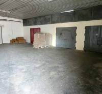 Spacious warehouse on Železničná Street suitable for storage; storage premises secured.