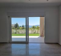 View from a 3-room apartment with a garden and sliding doors.