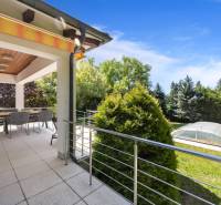 The terrace of a family house on Malokarpatská in Limbach with a view of the garden and pool.