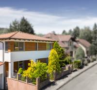 A family house on Malokarpatská Street in Limbach with a terrace and an ornamental garden.