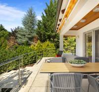 The terrace of a family house on Malokarpatská Street in Limbach with a view of the garden.