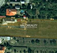 Aerial view of plots - housing in the village of Ruskov with marked dimensions.