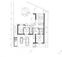 Floor plan of a family house showing rooms, kitchen, garage, and terrace.