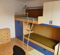 Children's room in a 3-room apartment with a bunk bed and storage space.