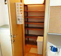 Compact storage space with built-in shelves in a 3-room apartment.