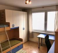 Children's room with a bunk bed and a desk in a 3-room apartment.