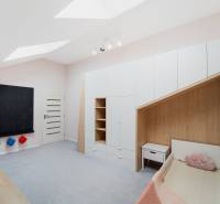 Children's room in a 4-room apartment with furniture and a board on the wall.