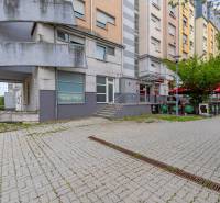 Commercial premises on Kresánkova Street in Bratislava - Karlova Ves with outdoor seating.