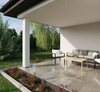 The terrace of a family house on Pánska Niva street, seating, greenery, and flowers.