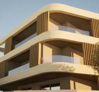 A three-story building with rounded balconies in the city of Vodice.