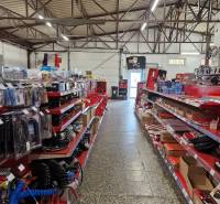 A store on Šamorínska Street full of tools, with a high ceiling and shelves for halls.
