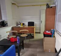 Office on Šamorínska with furniture, includes a desk, shelves, and office supplies.