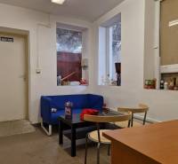 Space on Šamorínska Street with a sofa, tables, and storage spaces, suitable for warehouses.