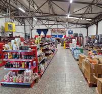 In the large warehouse on Šamorínska Street, there are shelves with a wide selection of products.