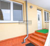 Entrance with red tiles to a 2-room apartment in Považská Bystrica.