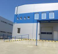 Warehouses and halls in Bratislava - Nové Mesto with blue and white panels and a ramp.