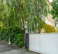 A view of a house surrounded by greenery on Brnianska Street in Bratislava - Staré Mesto.