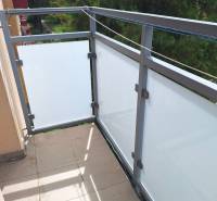 A balcony with a view of greenery in a 2-room apartment on Pavlovičovo námestie, Prešov.