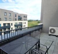 Terrace of a 3-room apartment on Pieskova Street in Nitra with a view of the surroundings.