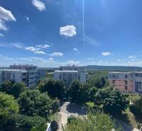 View from a 4-room apartment in Bratislava - Karlova Ves to the surrounding buildings and nature.