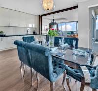 Luxury dining room with a view of the terrace in a 4-room apartment.