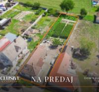 Family house in Jahodná with a garden and field for sale by a real estate agency.