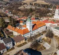 Aerial view of the historic part of the town of Gelnica with Banícke Square, hotels, and guesthouses.