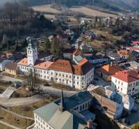 Gelnica, Miners' Square: historical buildings and picturesque landscape. Hotels and guesthouses in the vicinity.