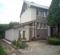 A family house in Nováky with a well-maintained garden, parking space, and landscaped surroundings.