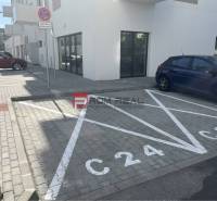 Parking space on Eduarda Wenzla Street in Bratislava III in front of commercial premises.
