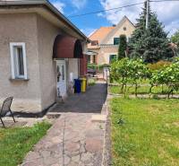 A family house on Nécseyho Street in Nitra with a garden and outdoor seating.