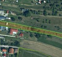 Aerial view of residential plots in the village of Bodovce, Bodovce Street, bordered by a green line.