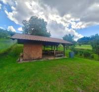 A shelter surrounded by greenery on a plot in Bodovce on Bodovce Street.