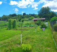 Garden in Bodovce on Bodovce Street for residential plots with a gazebo and greenery.